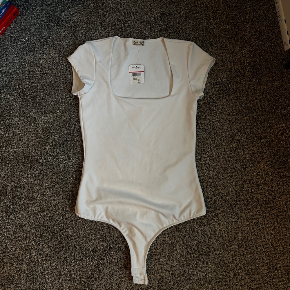 Free People White Short sleeve Bodysuit